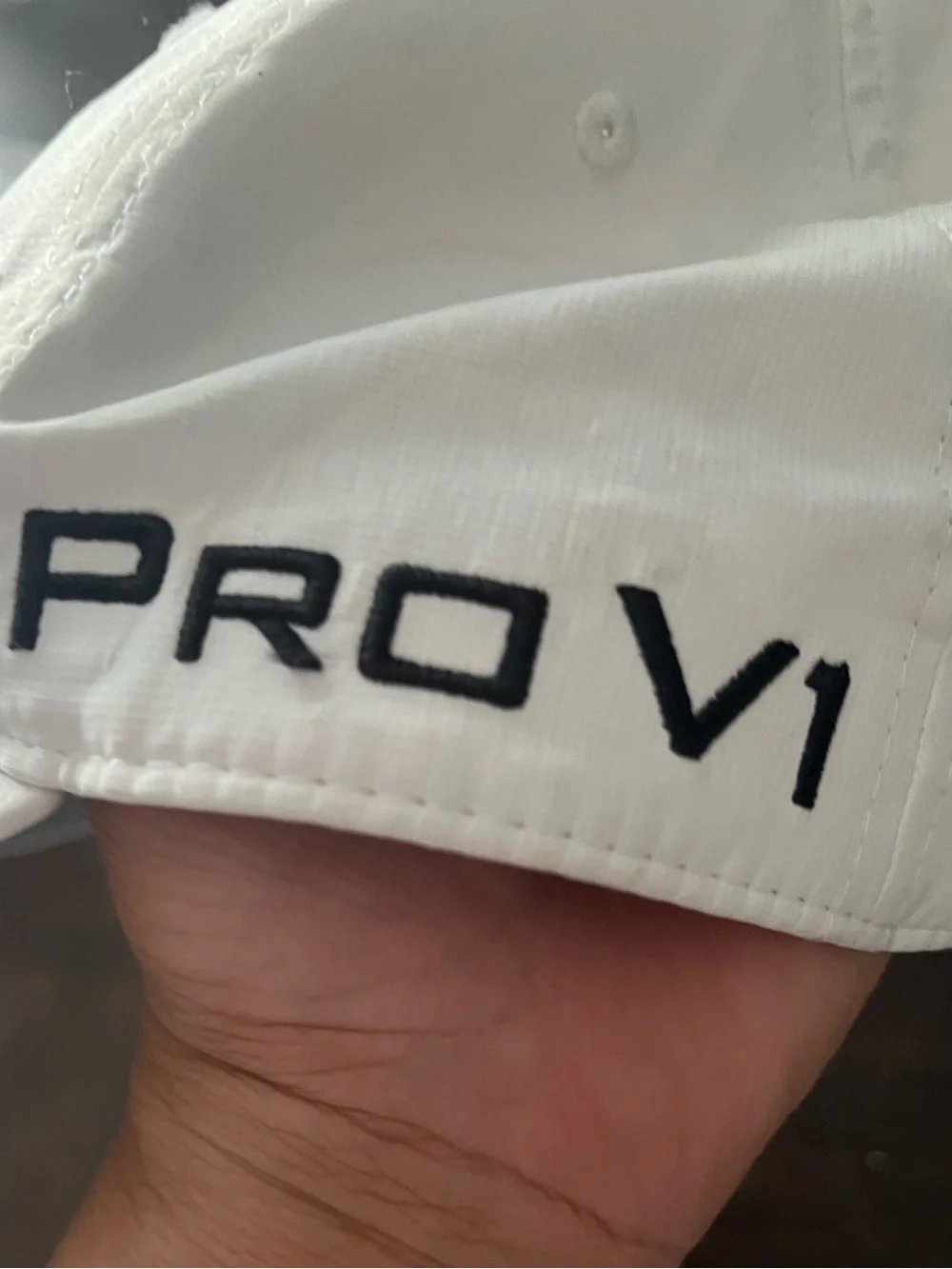 Titleist White Cap with Black and Red Patch